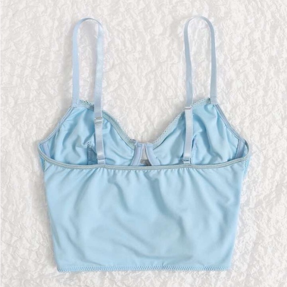 Blue corset with butterfly accents and string accents - Picture 3 of 3